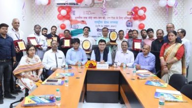 Photo of Top customers honored on Mails Day in National Postal Week by Postmaster General KK Yadav